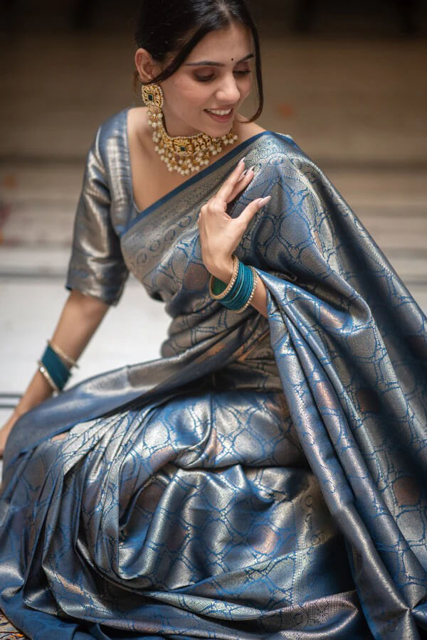 Demanding Blue Soft Silk Saree With Entrancing Blouse Piece