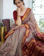 Eloquence Grey Soft Silk Saree With Pleasurable Blouse Piece