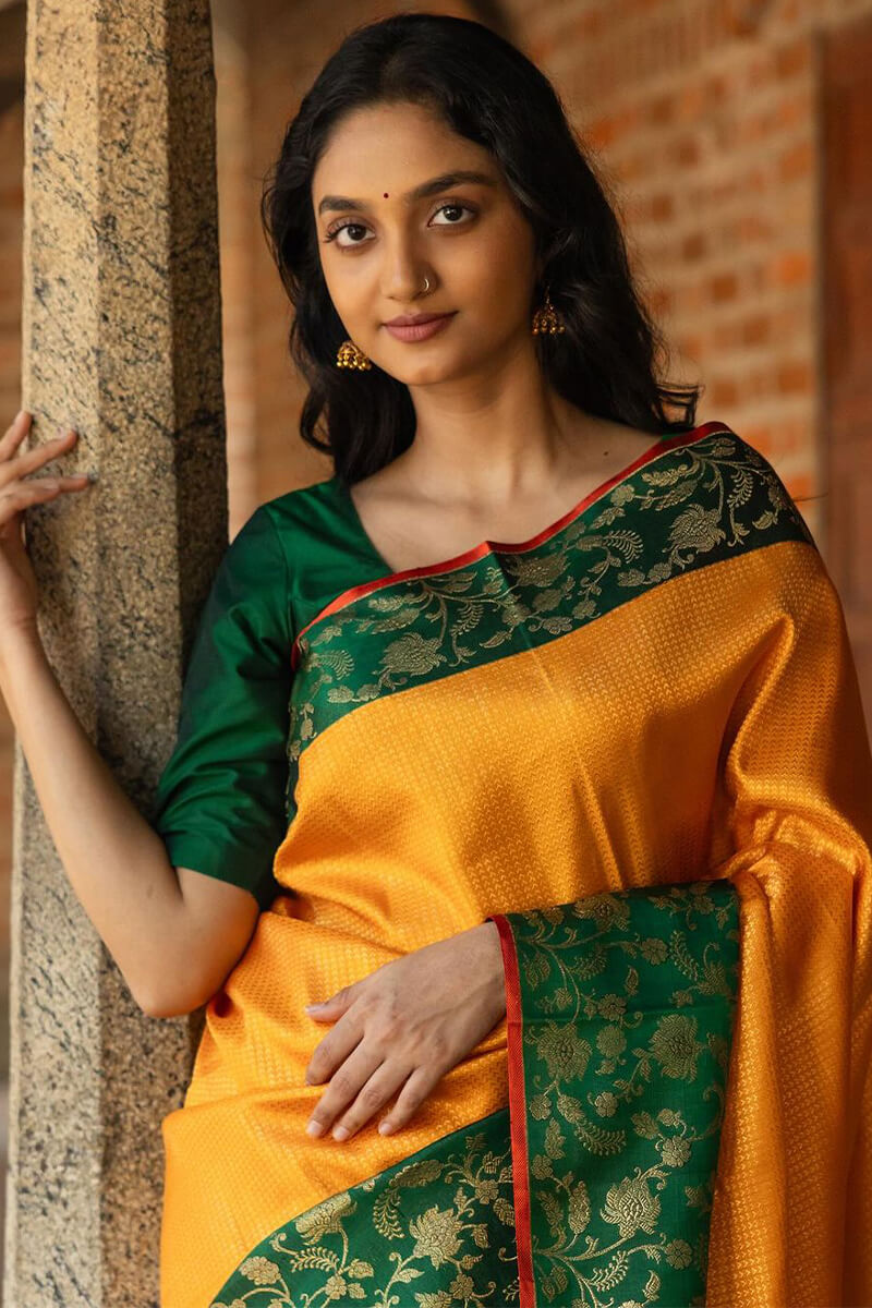 Beleaguer Yellow Soft Silk Saree With Quintessential Blouse Piece