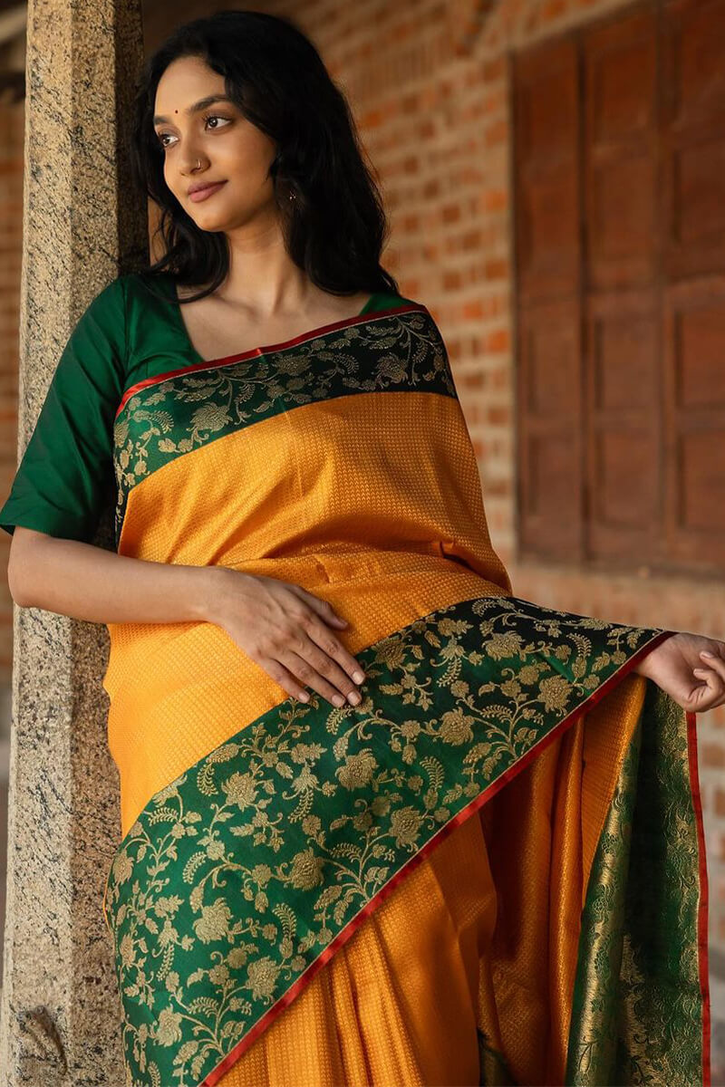 Beleaguer Yellow Soft Silk Saree With Quintessential Blouse Piece