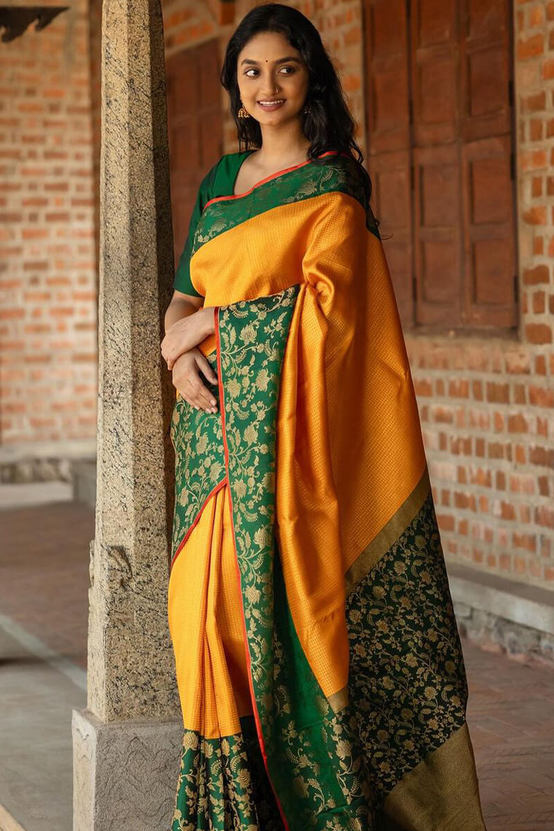 Beleaguer Yellow Soft Silk Saree With Quintessential Blouse Piece