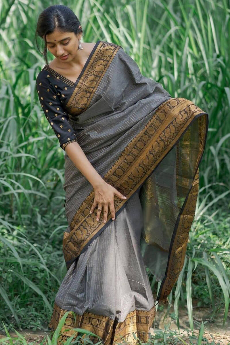 A glam Grey Soft Silk Saree With Epiphany Blouse Piece