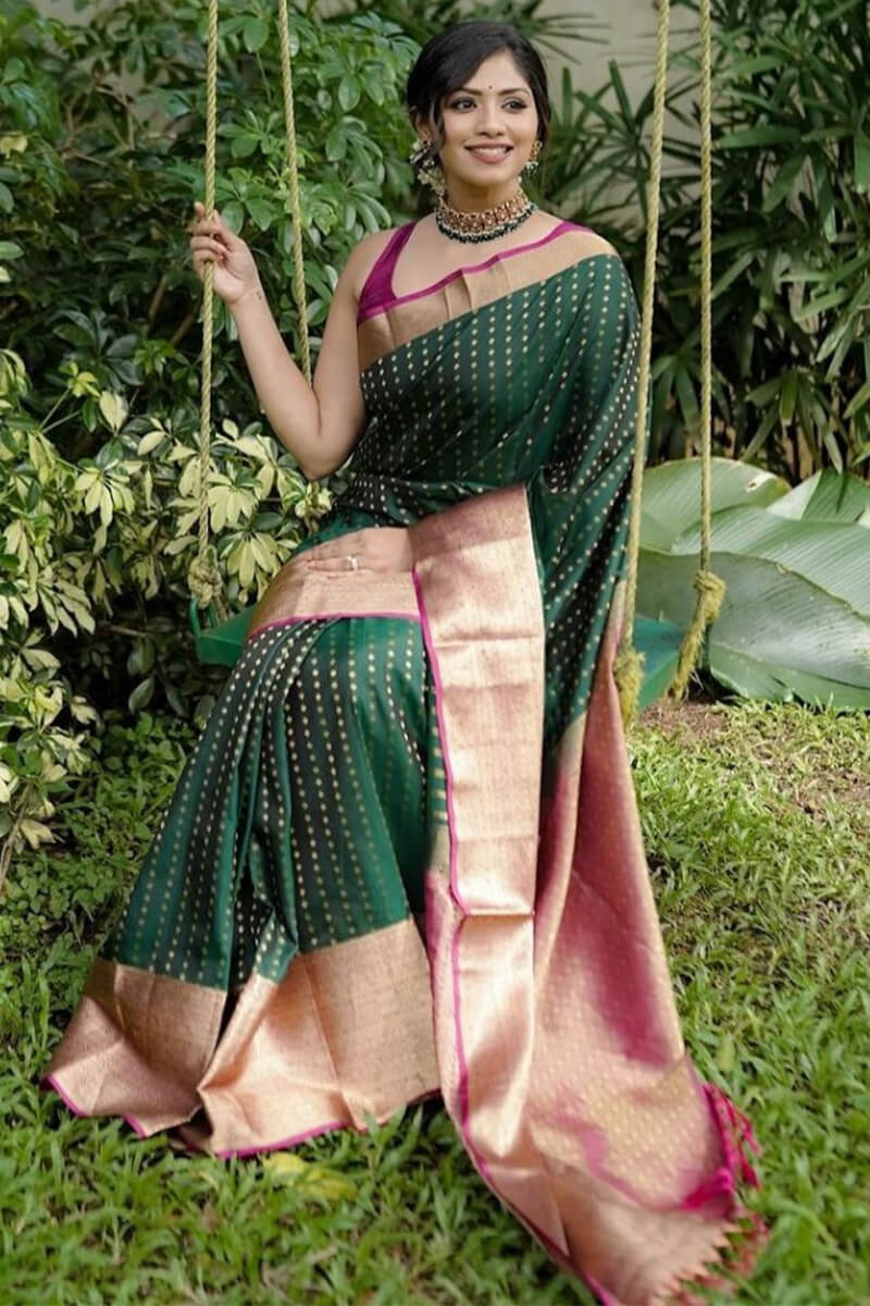 Allure Dark Green Soft Silk Saree With Flattering Blouse Piece