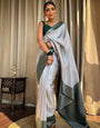 Adorning Grey Soft Silk Saree With Blissful Blouse Piece