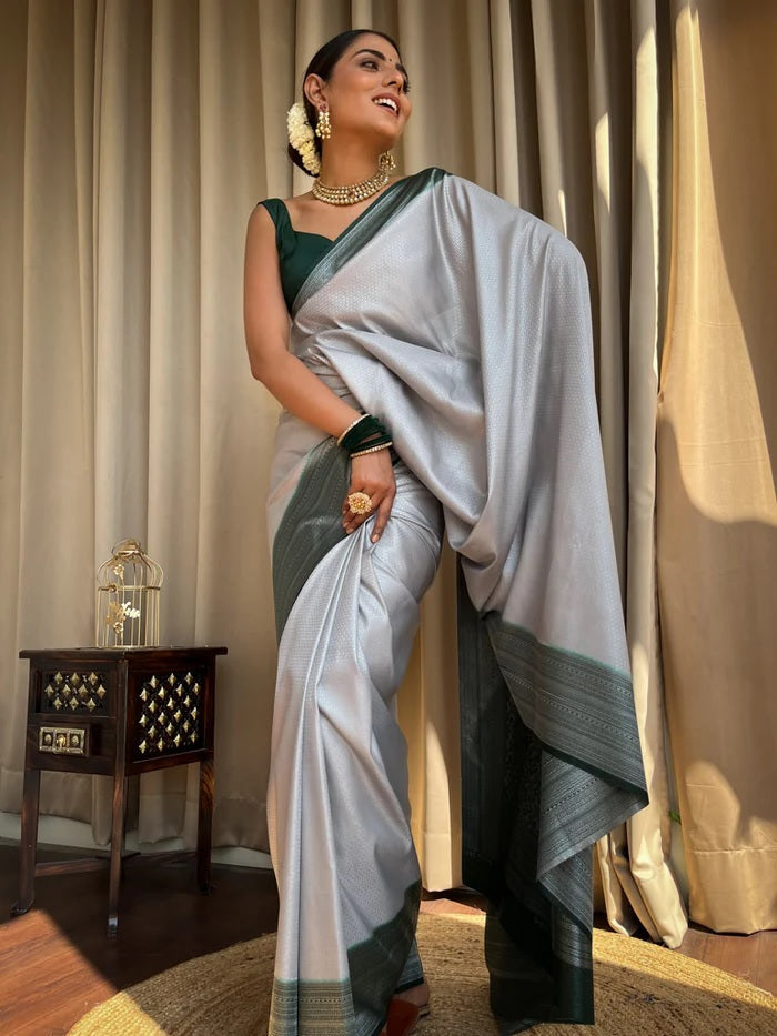 Adorning Grey Soft Silk Saree With Blissful Blouse Piece