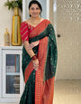Energetic  Dark Green Soft Silk Saree With Innovative Blouse Piece
