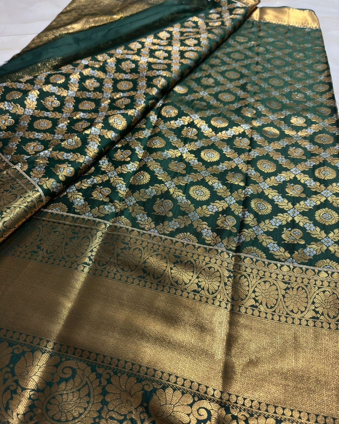 Amazing Dark Green Soft Silk Saree With Adorable Blouse Piece