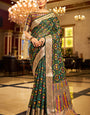 Redolent Dark Green Organza Silk Saree With Engrossing Blouse Piece
