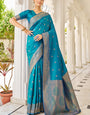 Elision Firozi Kanjivaram Silk Saree With Beleaguer Blouse Piece