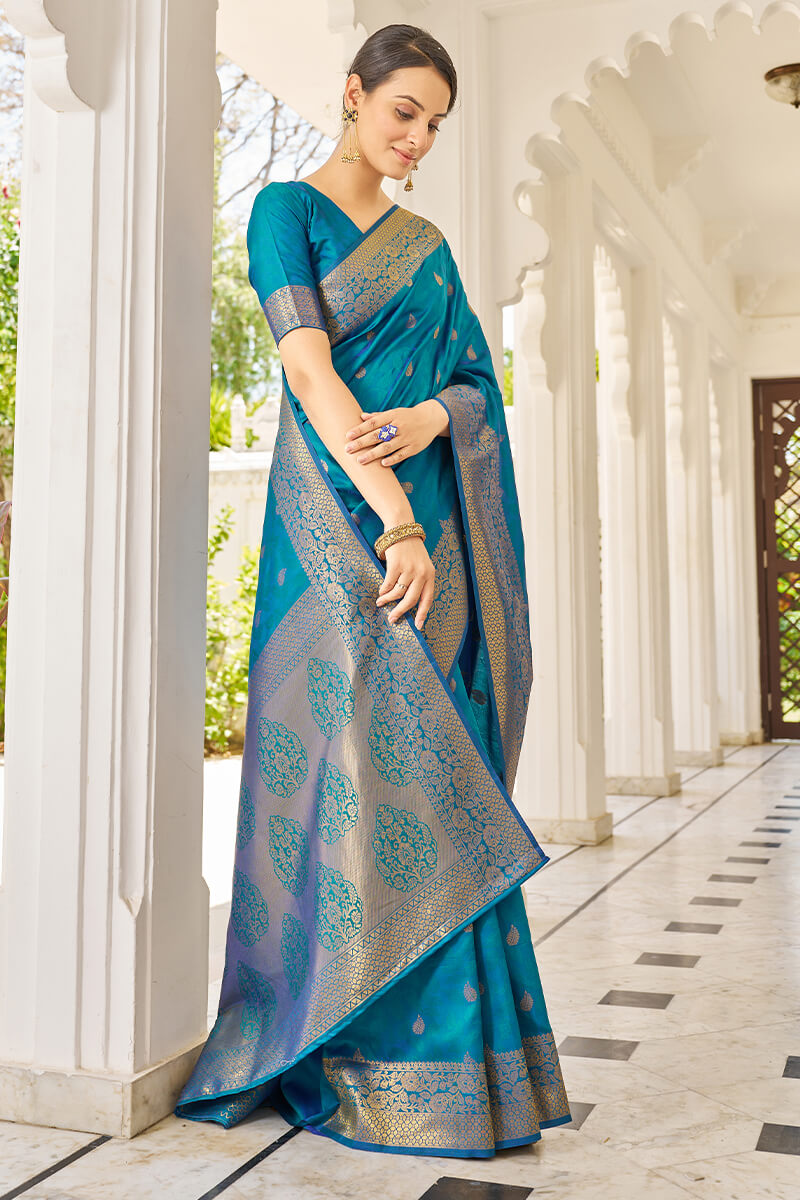 Elision Firozi Kanjivaram Silk Saree With Beleaguer Blouse Piece