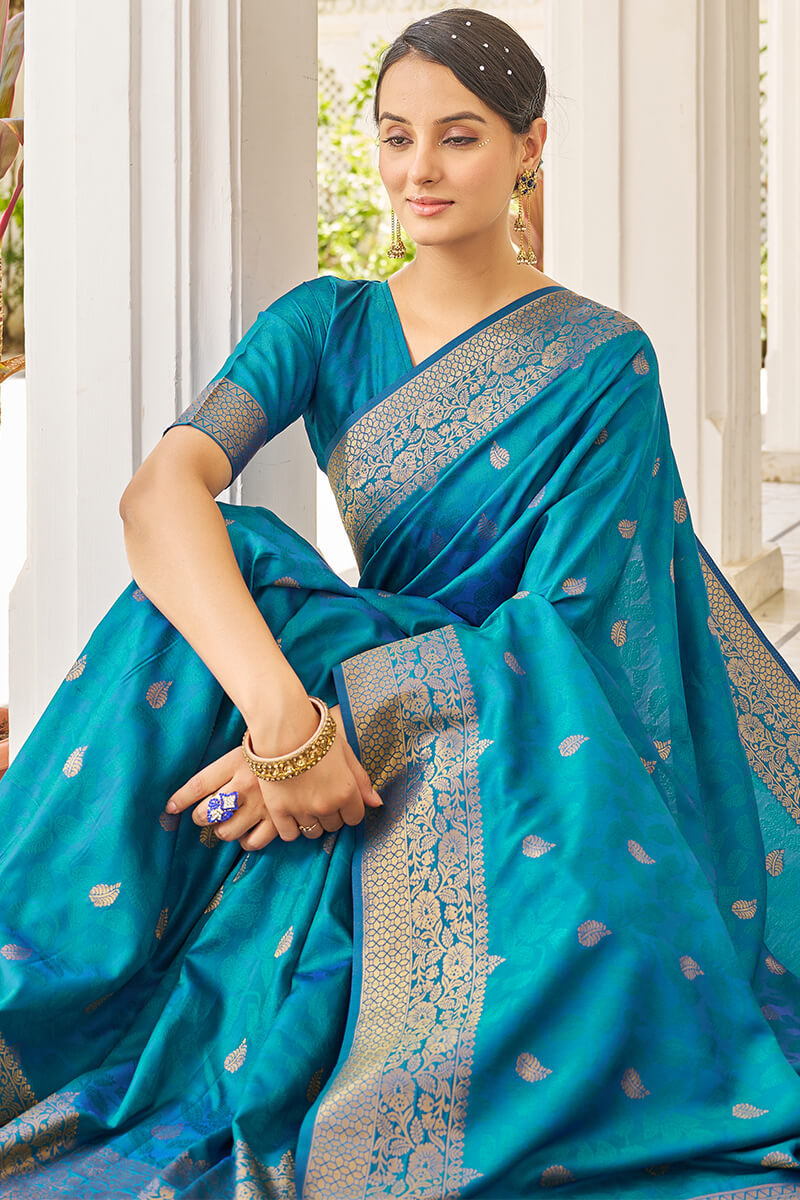 Elision Firozi Kanjivaram Silk Saree With Beleaguer Blouse Piece