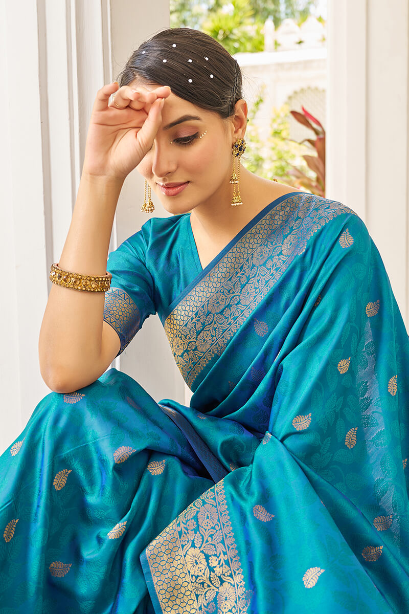 Elision Firozi Kanjivaram Silk Saree With Beleaguer Blouse Piece