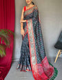 Sizzling Grey Patola Silk Saree with Beleaguer Blouse Piece