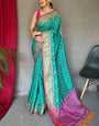 Designer Turquoise Patola Silk Saree with Serendipity Blouse Piece