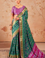 Enigmatic Green Patola Silk Saree with Exceptional Blouse Piece