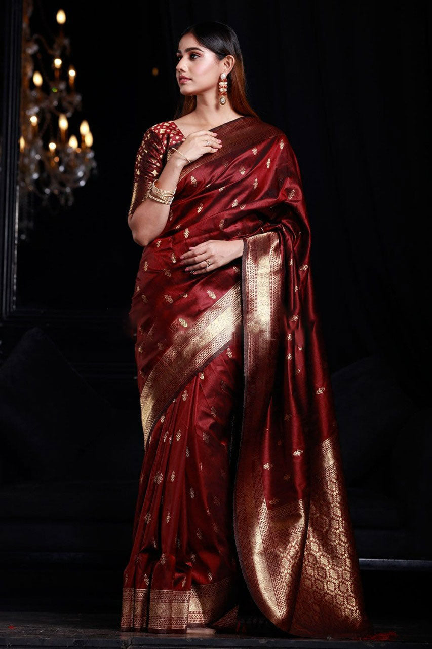 Opulent Maroon Banarasi Silk Saree With Piquant Blouse Piece