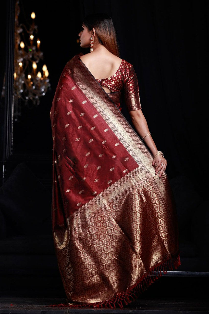 Opulent Maroon Banarasi Silk Saree With Piquant Blouse Piece