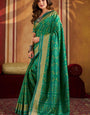 Desirable Green Patola Silk Saree with Chatoyant Blouse Piece
