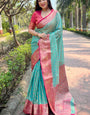 Elaborate Firozi Soft Banarasi Tissue Silk Saree With Epiphany Blouse Piece