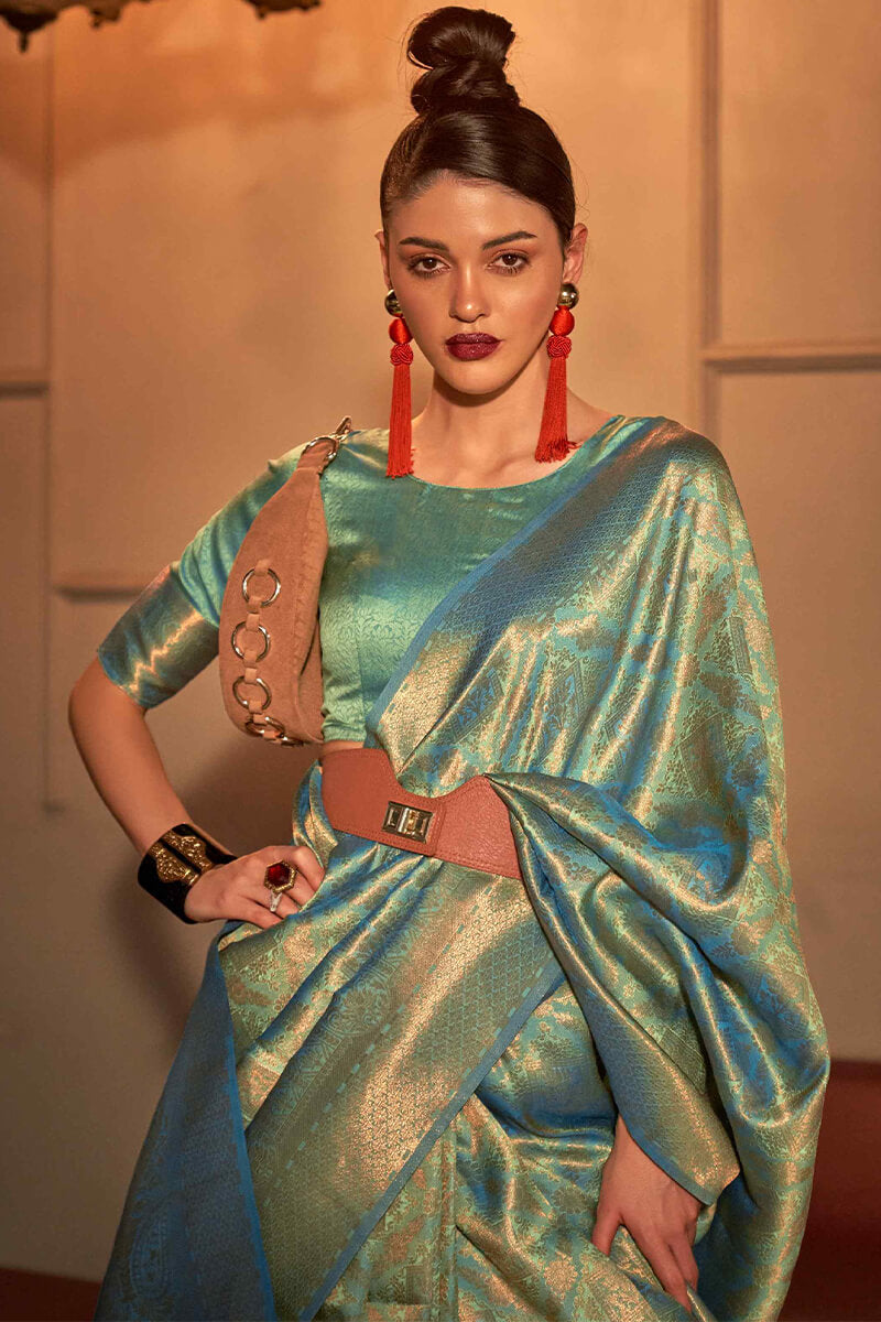 Susurrous Rama Kanjivaram Silk Saree With Moiety Blouse Piece