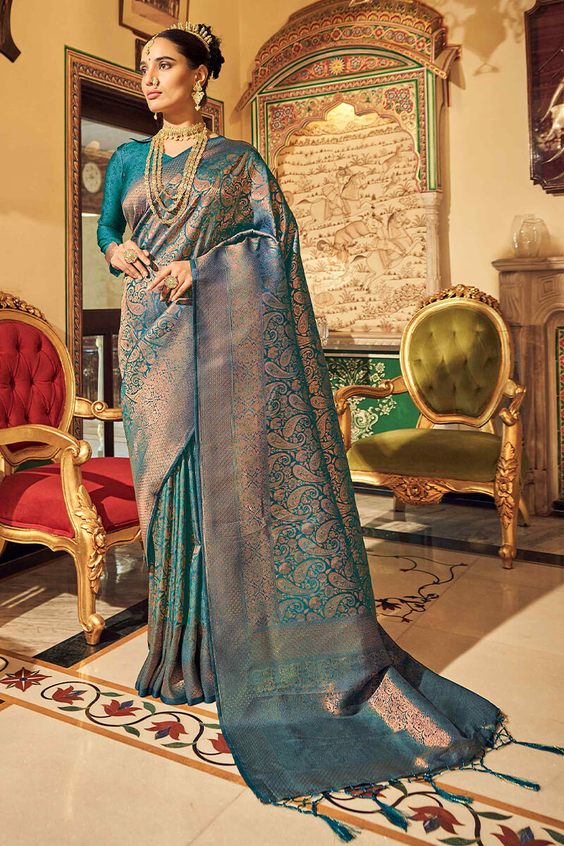 Sumptuous Rama Kanjivaram Silk Saree With Lissome Blouse Piece