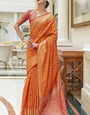 Arresting Orange Soft Patola Silk Saree with Entrancing Blouse Piece