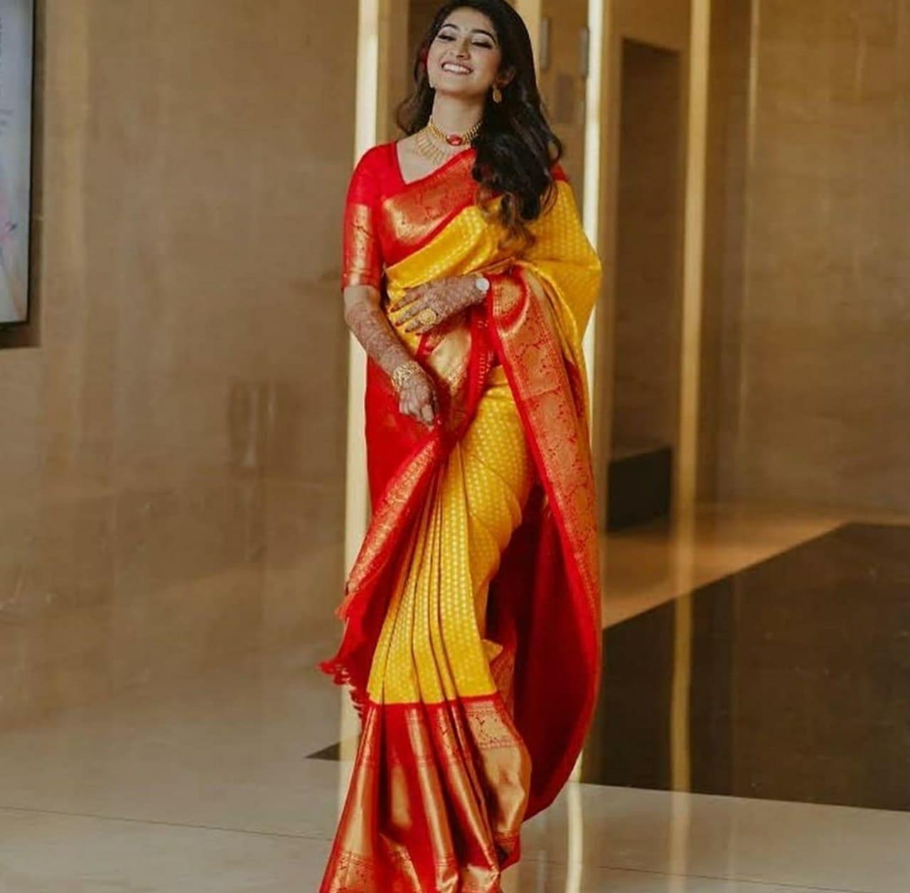 Adoring Yellow Soft Banarasi Silk Saree With Serendipity Blouse Piece