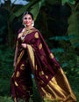 Entrancing Wine Soft Banarasi Silk Saree With Palimpsest Blouse Piece