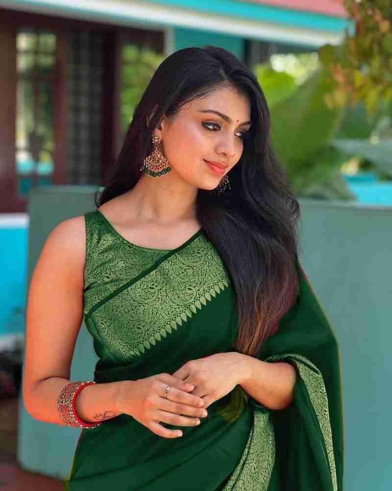 Enticing Green Soft Silk Saree With Beleaguer Blouse Piece