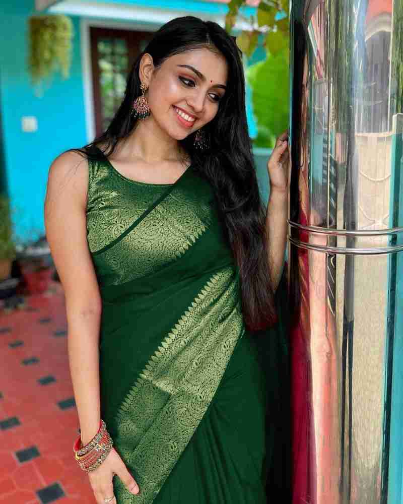 Enticing Green Soft Silk Saree With Beleaguer Blouse Piece