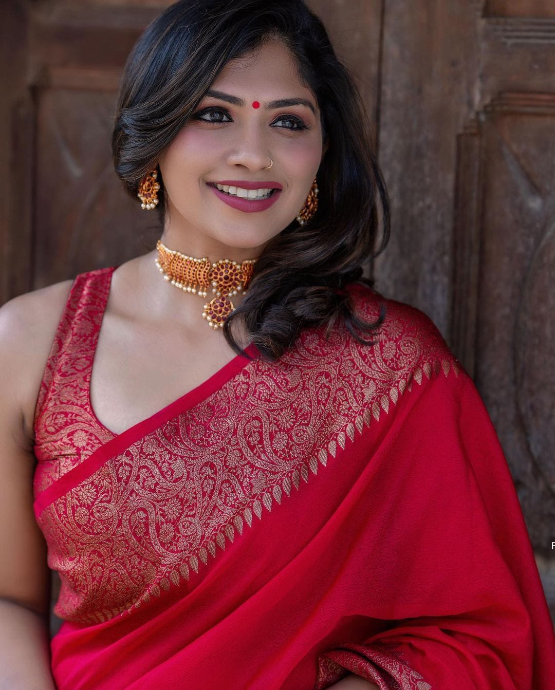 Divine Red Soft Silk Saree With Assemblage Blouse Piece