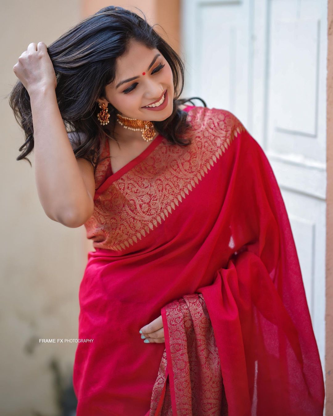 Divine Red Soft Silk Saree With Assemblage Blouse Piece