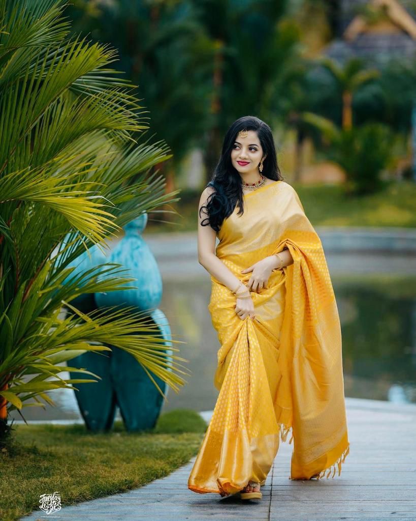 Prominent Yellow Soft Banarasi Silk Saree With Epiphany Blouse Piece