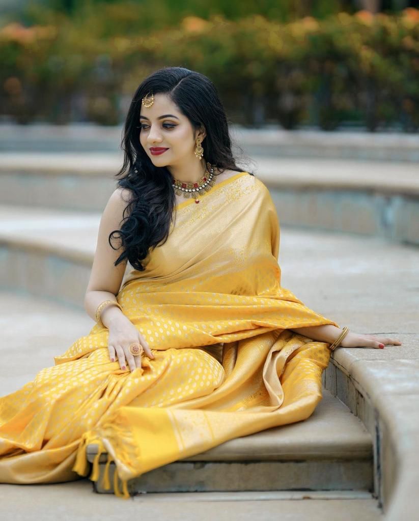 Prominent Yellow Soft Banarasi Silk Saree With Epiphany Blouse Piece