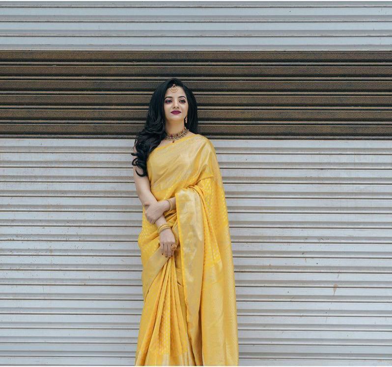 Prominent Yellow Soft Banarasi Silk Saree With Epiphany Blouse Piece