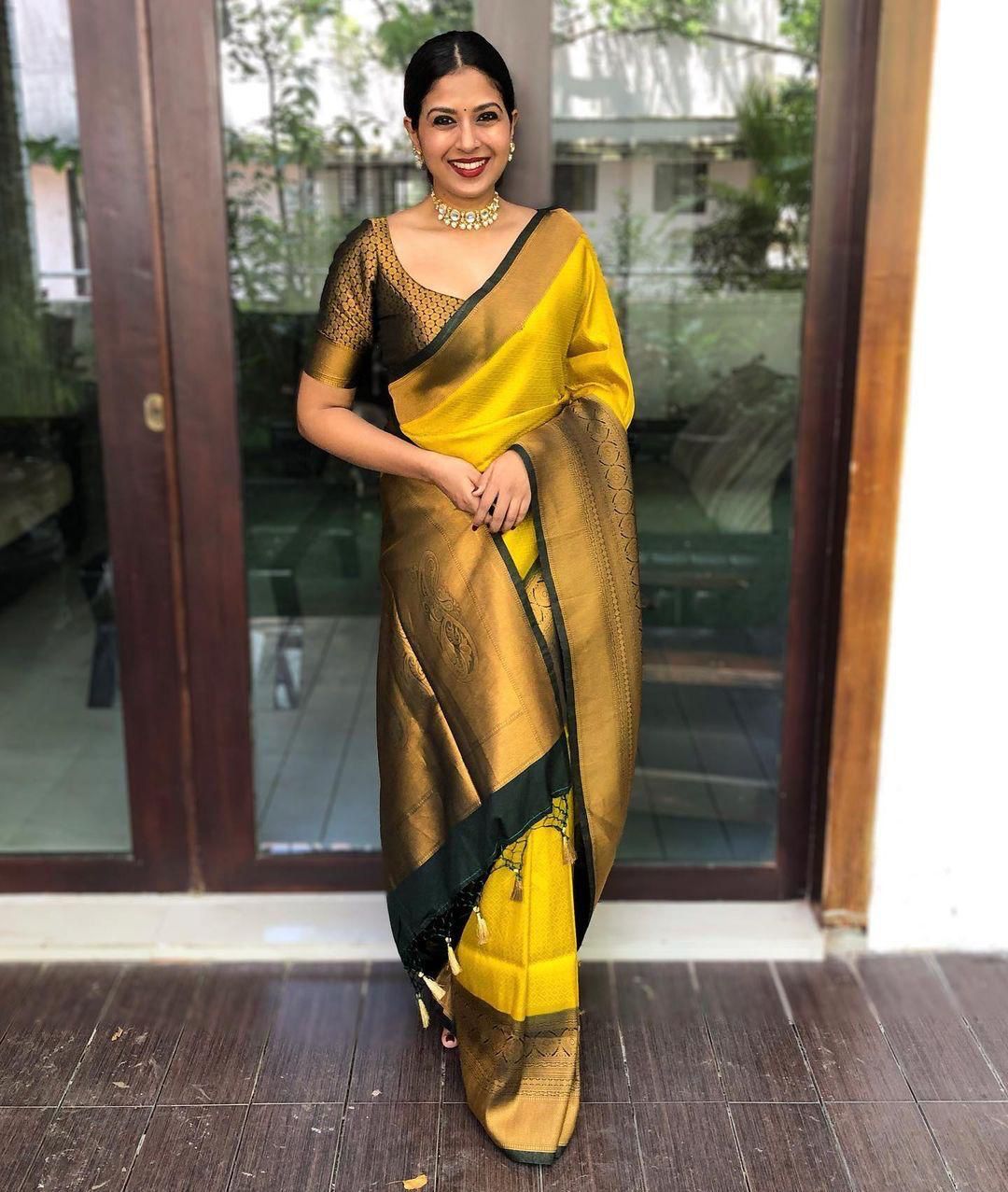 Gleaming yellow Soft Banarasi Silk Saree With Fancifull Blouse Piece