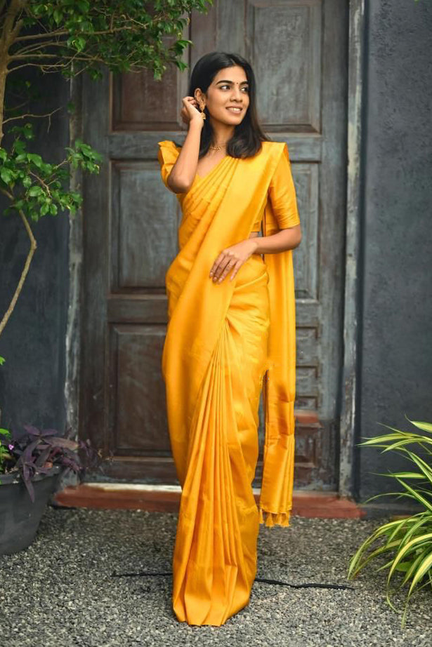 Stylish Yellow Soft Silk Saree With Adorning Blouse Piece