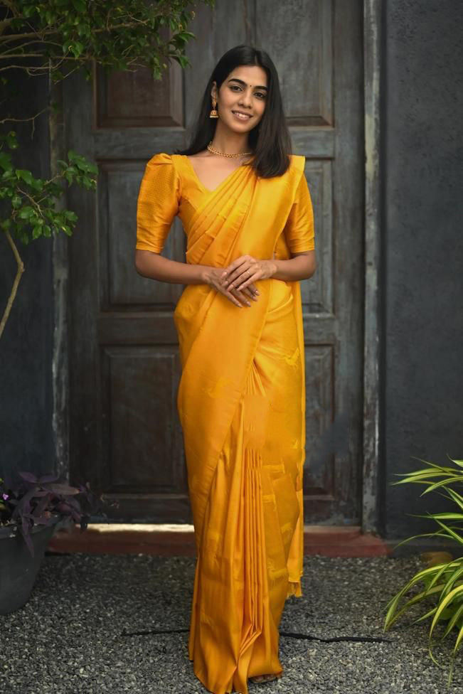 Stylish Yellow Soft Silk Saree With Adorning Blouse Piece