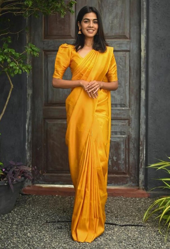 Stylish Yellow Soft Silk Saree With Adorning Blouse Piece