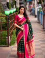 Divine Dark Green Soft Silk Saree With Denouement Blouse Piece