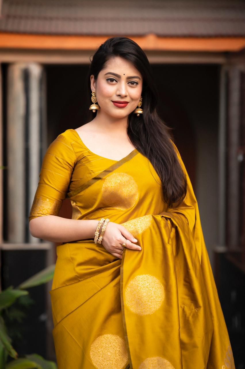 Elaborate Yellow Soft Silk Saree With Seraphic Blouse Piece