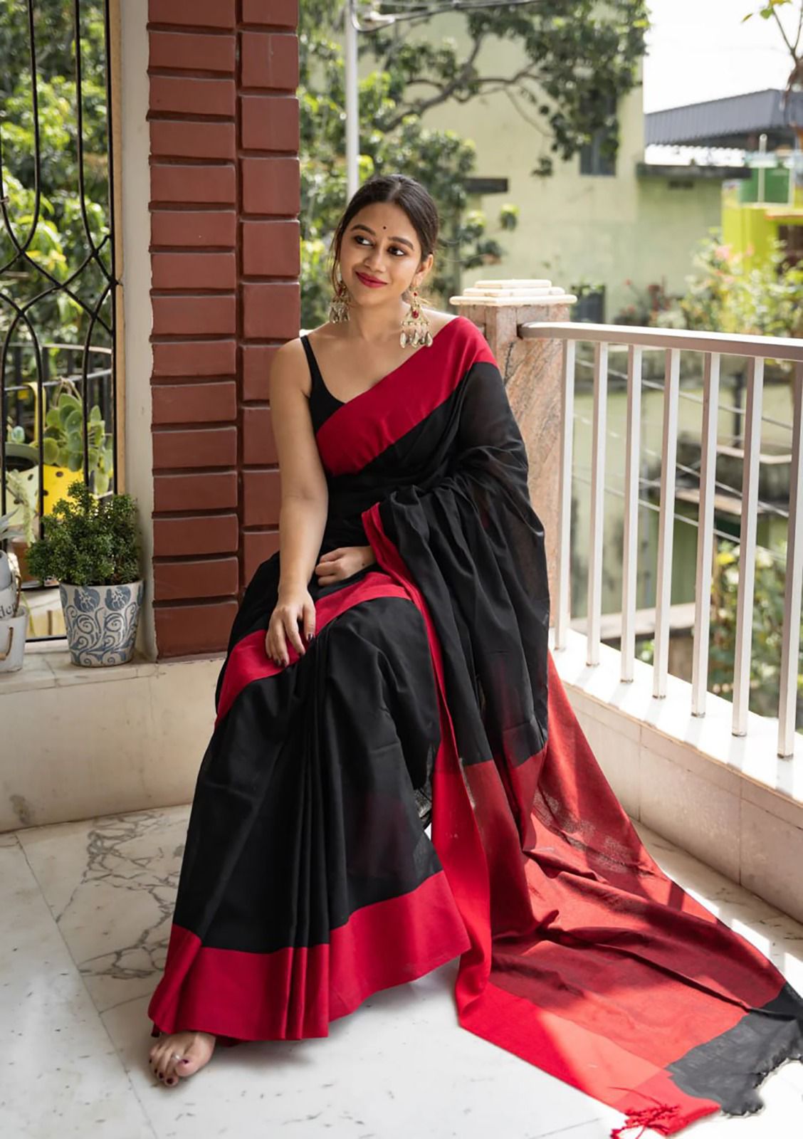 Tempting Black Cotton Silk Saree With Quixotic Blouse Piece