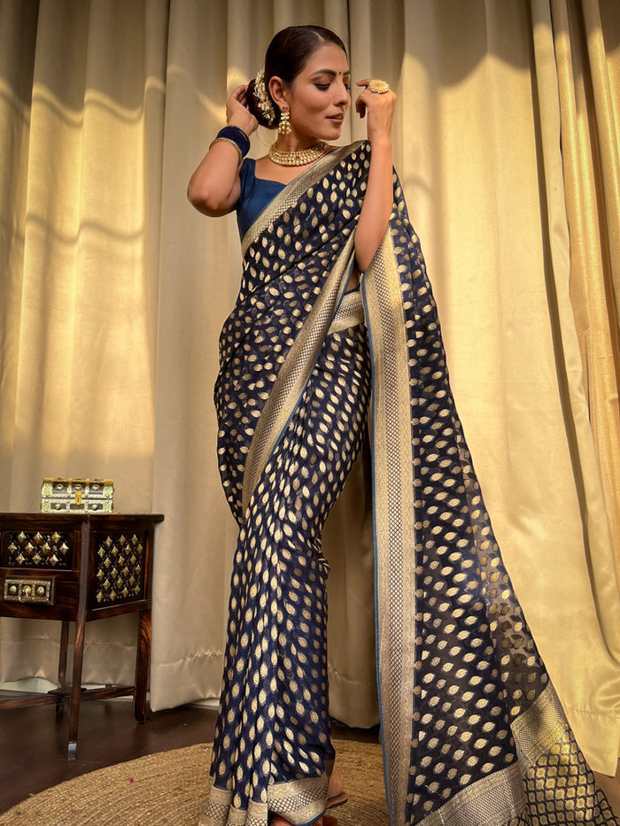 Engrossing Navy Blue Soft Banarasi Silk Saree With Embellished Blouse