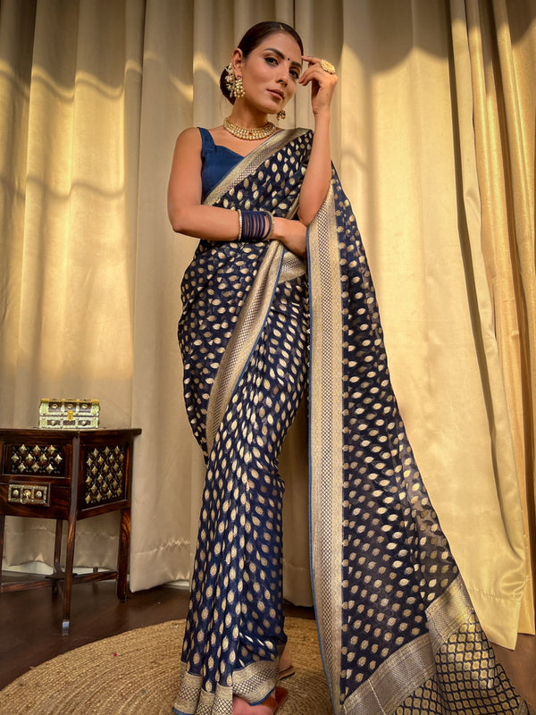 Engrossing Navy Blue Soft Banarasi Silk Saree With Embellished Blouse