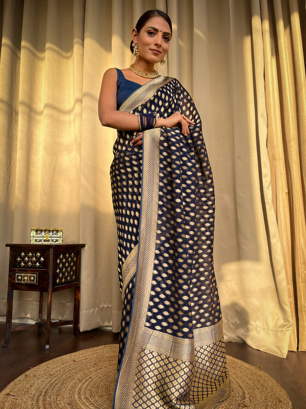 Engrossing Navy Blue Soft Banarasi Silk Saree With Embellished Blouse