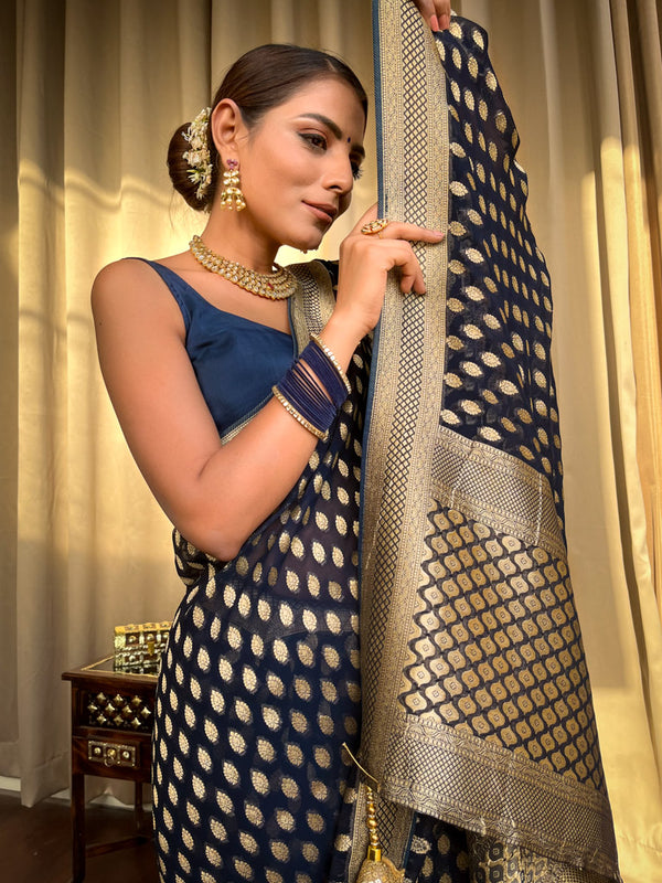 Engrossing Navy Blue Soft Banarasi Silk Saree With Embellished Blouse