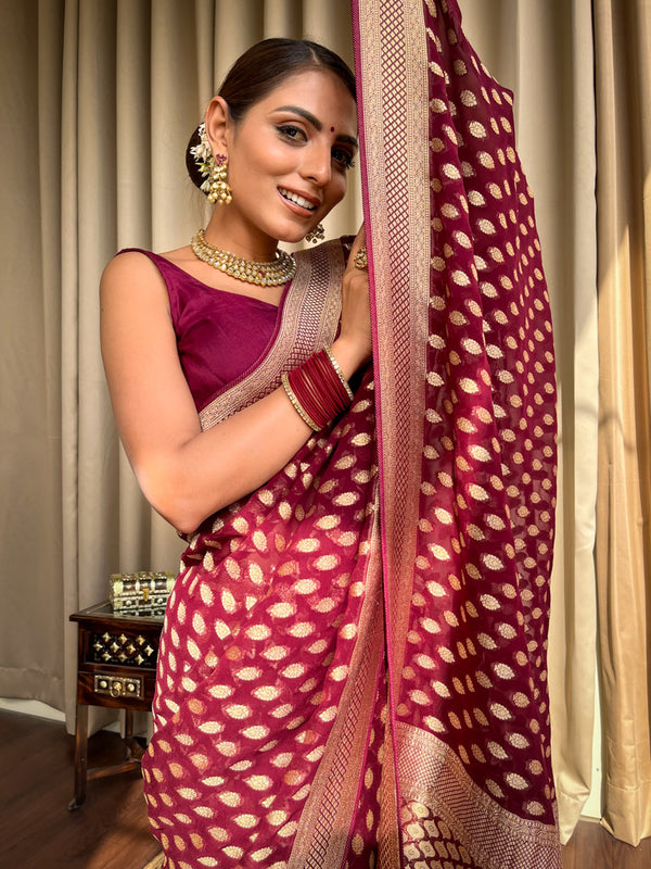 Enthralling Wine Soft Banarasi Silk Saree With Embrocation Blouse