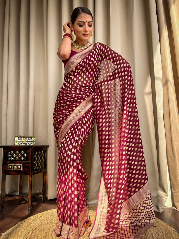 Enthralling Wine Soft Banarasi Silk Saree With Embrocation Blouse