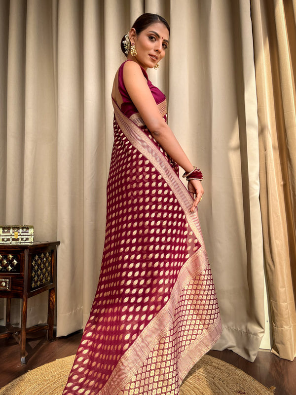 Enthralling Wine Soft Banarasi Silk Saree With Embrocation Blouse