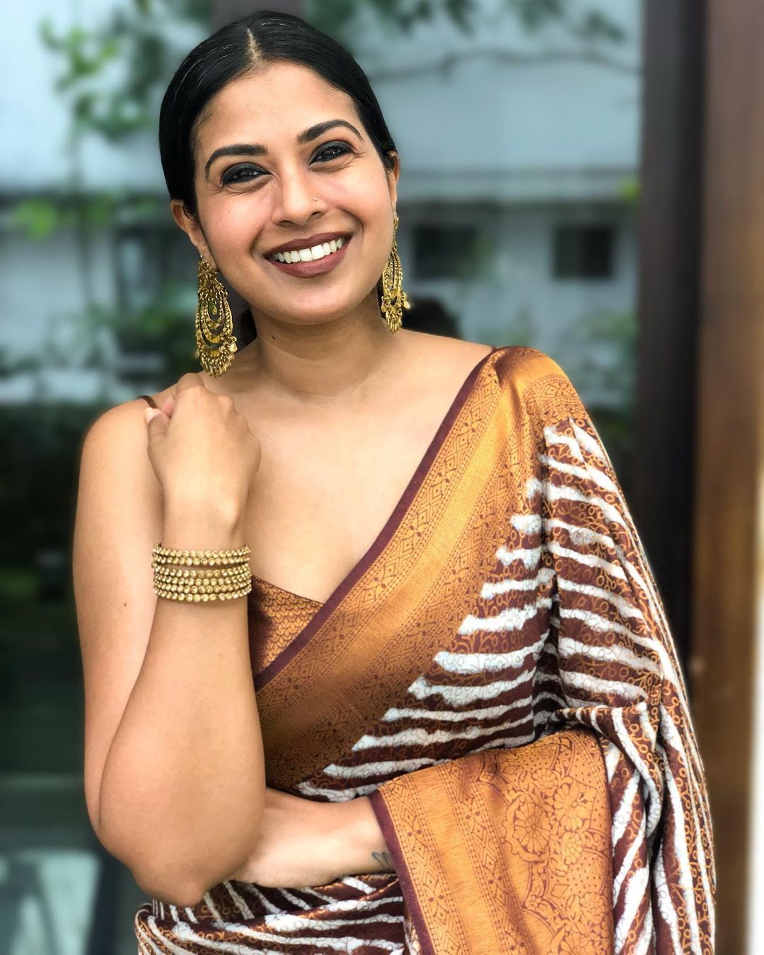 Symmetrical Brown Soft Silk Saree with Artistic Blouse Piece